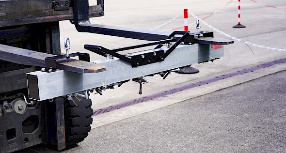 Fork Lift Mounted Magnetic Sweeper collecting nails