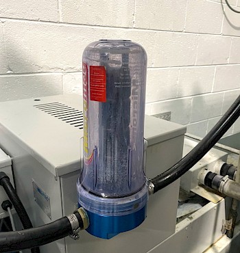 A magnetic filter attached to a machine